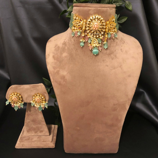Luxury baby pink and mint green beaded Kundan choker necklace set with matching earrings, elegant statement jewelry for South Asian bridal weddings and receptions.