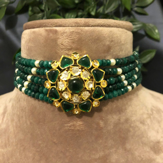 Luxury green emerald beaded Kundan choker necklace set with matching earrings, elegant statement jewelry for South Asian bridal weddings and receptions.