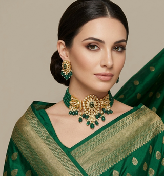 Luxury green emerald beaded Kundan choker set with matching earrings, an elegant statement piece for South Asian bridal weddings and nikah ceremonies, as seen in www.taniska.com