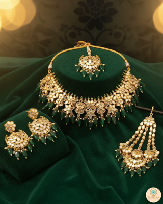 Luxury green glass work Kundan bridal necklace set with matching earrings and headpiece, statement jewelry for South Asian weddings and nikah ceremonies.