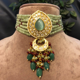 Luxury green beaded Kundan choker necklace set with matching earrings, perfect for South Asian bridal weddings and receptions.