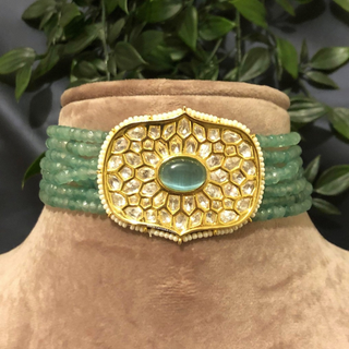 Luxury mint beaded Kundan choker necklace set featuring mint green and soft pink beads with matching earrings, elegant statement jewelry for South Asian bridal weddings and festive receptions.