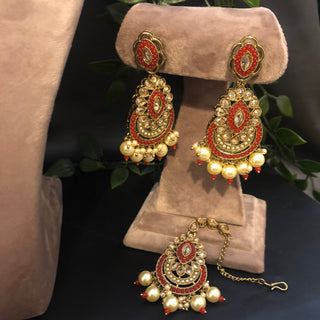 Luxury red and gold Kundan bridal necklace set with matching earrings and maang tikka, statement jewelry for South Asian weddings and nikah ceremonies.
