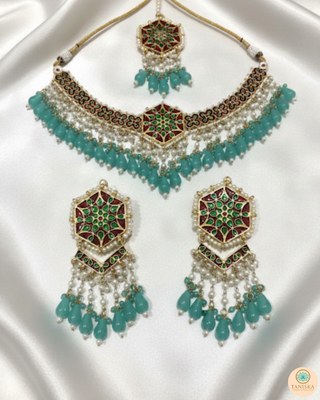Luxury turquoise meenakari Kundan choker necklace set with matching earrings and maang tikka, vibrant statement jewelry for South Asian bridal weddings and festive occasions