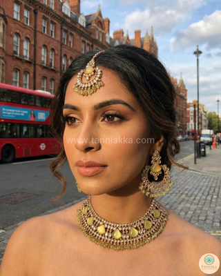 Luxury yellow Kundan bridal necklace set with matching earrings and maang tikka, elegant statement jewelry for South Asian weddings and nikah ceremonies.