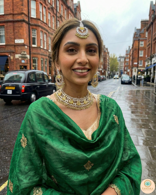 Luxury yellow Kundan bridal necklace set with matching earrings and maang tikka, elegant statement jewelry for South Asian weddings and nikah ceremonies.