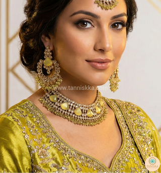 Luxury yellow Kundan bridal necklace set with matching earrings and maang tikka, elegant statement jewelry for South Asian weddings and nikah ceremonies.