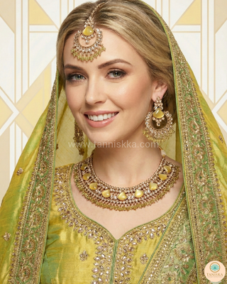 Luxury yellow Kundan bridal necklace set with matching earrings and maang tikka, elegant statement jewelry for South Asian weddings and nikah ceremonies.