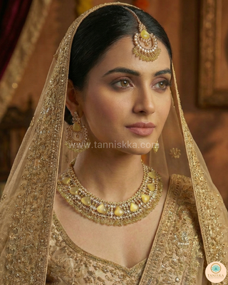 Luxury yellow Kundan bridal necklace set with matching earrings and maang tikka, elegant statement jewelry for South Asian weddings and nikah ceremonies.
