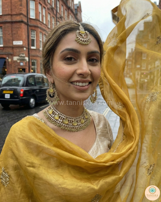 Luxury yellow Kundan bridal necklace set with matching earrings and maang tikka, elegant statement jewelry for South Asian weddings and nikah ceremonies.