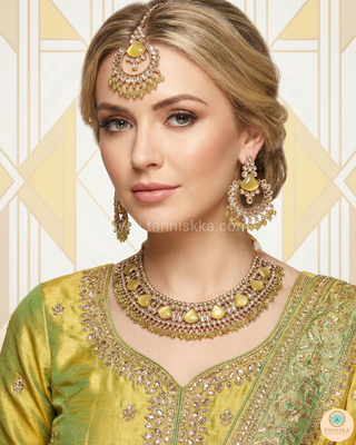 Luxury yellow Kundan bridal necklace set with matching earrings and maang tikka, elegant statement jewelry for South Asian weddings and nikah ceremonies.