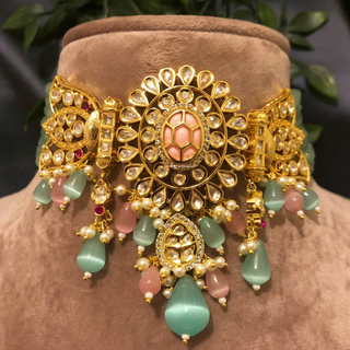 Luxury baby pink and mint green beaded Kundan choker necklace set with matching earrings, elegant statement jewelry for South Asian bridal weddings and receptions.