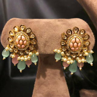 Luxury baby pink and mint green beaded Kundan choker necklace set with matching earrings, elegant statement jewelry for South Asian bridal weddings and receptions.