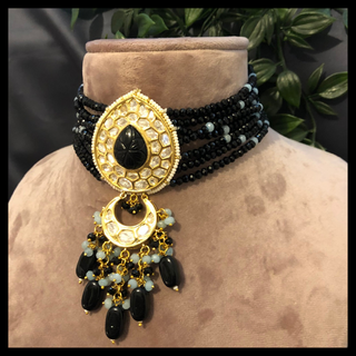 Luxury black glass work Kundan bridal necklace set with matching earrings and headpiece, statement jewelry for South Asian weddings and nikah ceremonies.