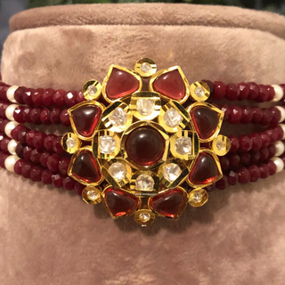 Luxury maroon beaded Kundan choker necklace set with matching earrings, elegant statement jewelry for South Asian bridal weddings and receptions.