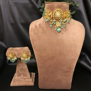Luxury mint green beaded Kundan choker necklace set with matching earrings, elegant statement jewelry for South Asian bridal weddings and receptions.
