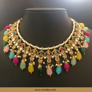 Luxury multicolor beaded Kundan bridal necklace set with matching earrings and maang tikka, vibrant statement jewelry for South Asian weddings and festive celebrations.