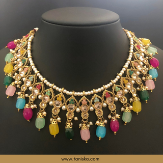 Luxury multicolor beaded Kundan bridal necklace set with matching earrings and maang tikka, vibrant statement jewelry for South Asian weddings and festive celebrations.