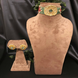 Luxury multicolor beaded Kundan choker necklace set featuring mint green and soft pink beads with matching earrings, elegant statement jewelry for South Asian bridal weddings and festive receptions.