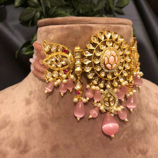 Luxury pink beaded Kundan choker set with matching earrings, an elegant statement piece for South Asian bridal weddings and nikah ceremonies, as seen in www.taniska.com