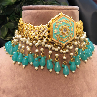 Luxury turquoise meenakari Kundan choker necklace set with matching earrings and maang tikka, vibrant statement jewelry for South Asian bridal weddings and festive occasions