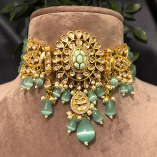Luxury mint green beaded Kundan choker necklace set with matching earrings, elegant statement jewelry for South Asian bridal weddings and receptions.